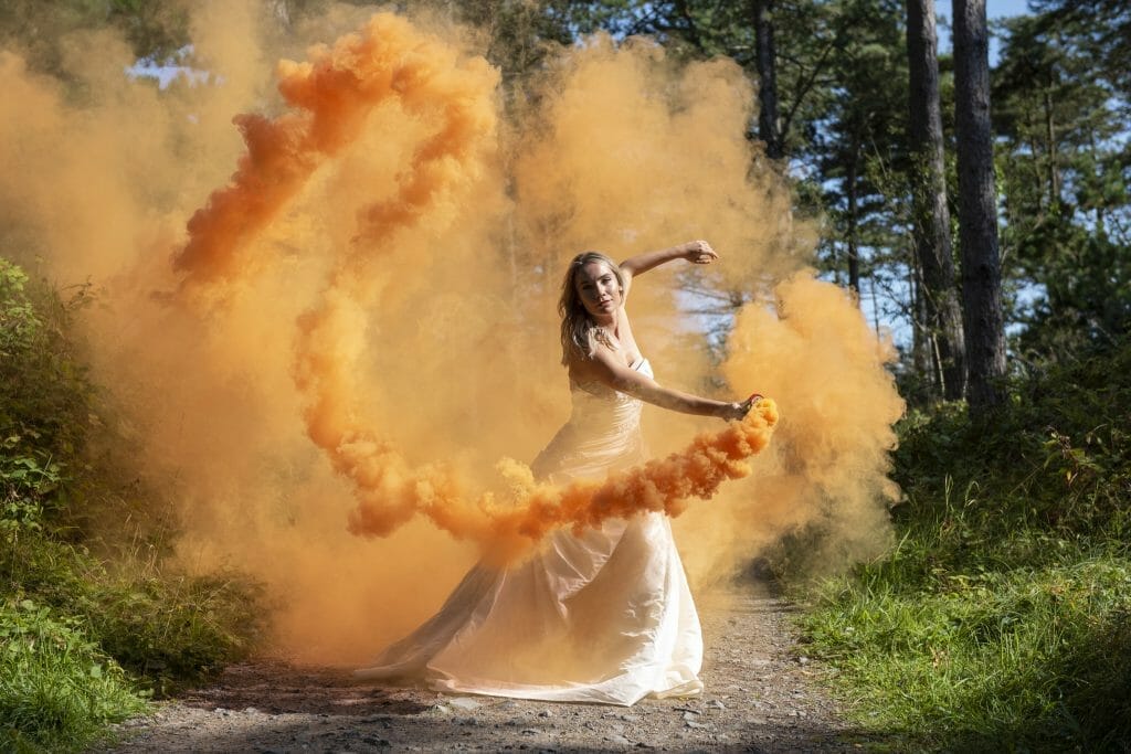 Frocks on Rocks - Trash The Dress - Photo-Shoot - Female Dancer with Orange Smoke Bomb - taken at a Welshot Photographic Workshop