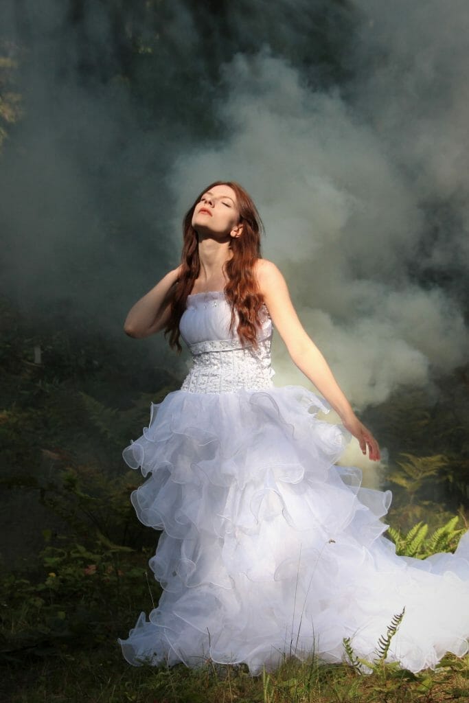 Welshot Model posing in a Wedding Dress on a Trash The Dress Photo-Shoot in North Wales where Welshot Imaging Photographic Academy delegates were learning about photographic lighting and shooting techniques.