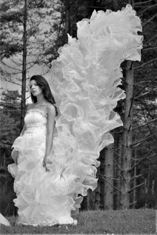 Welshot Model posing in a Wedding Dress on a Trash The Dress Photo-Shoot in North Wales where Welshot Imaging Photographic Academy delegates were learning about photographic lighting and shooting techniques.