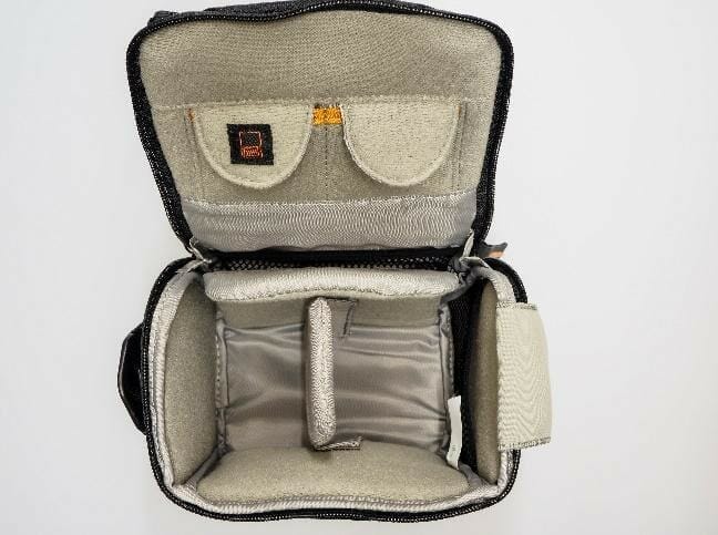 A picture containing indoor, accessory, bag, case
Description automatically generated