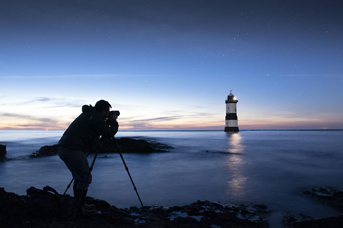 Photo of a Photographer learning How To Photograph the Night Sky at Penmon Point Anglesey with the Welshot Photographic Academy