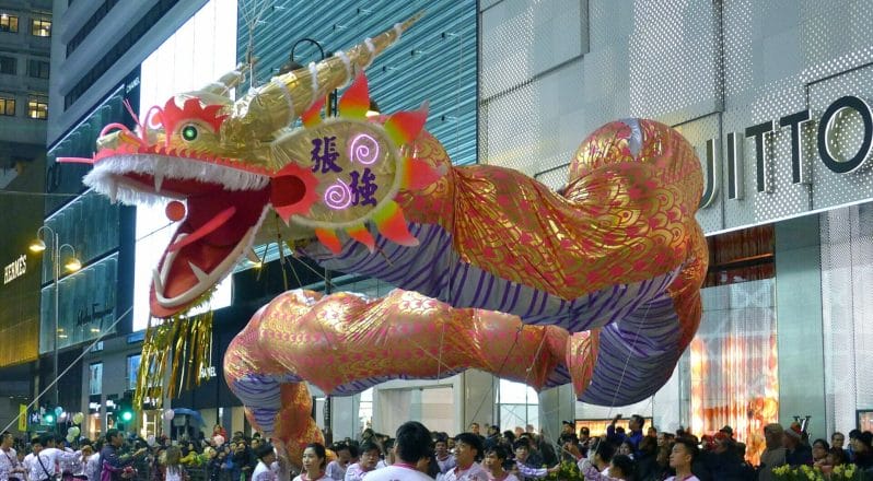 Street Photography Meets Chinese New Year - Photo of a Chinese Dragon parading in the streets during Chinese New Year