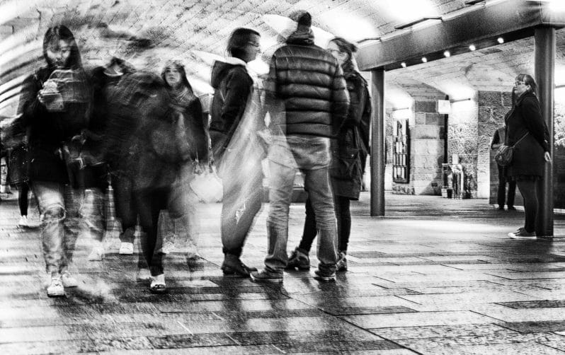 Street Photography Meets Chinese New Year - Black and White Long Exposure photo of people moving on a busy stree