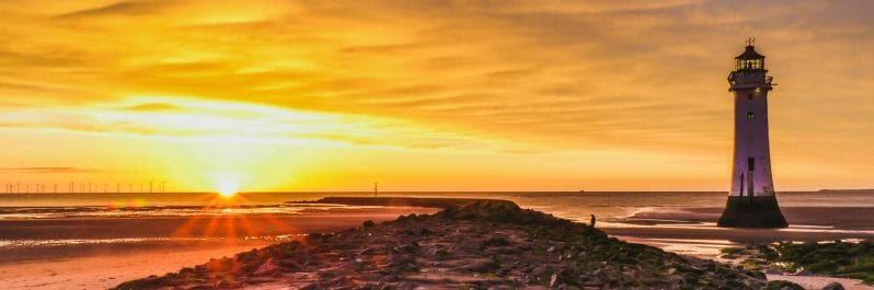Lighthouses, Skylines, Photography and Fish n Chips  - Photo of Perch Rock Lighthouse in New Brighton with the sun setting behind