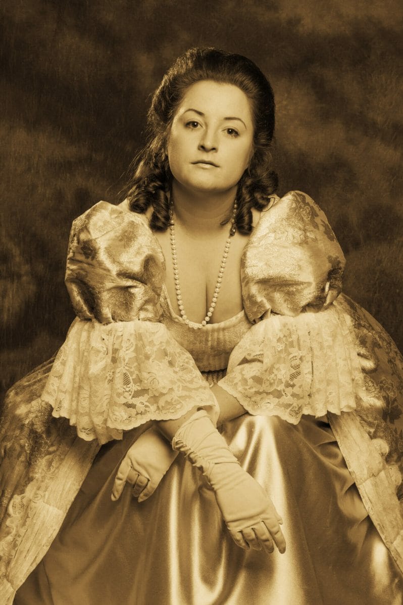 Photography & Period Costumes on Location at The Bulkeley Hotel - Sepia photograph of a female model wearing period costume
