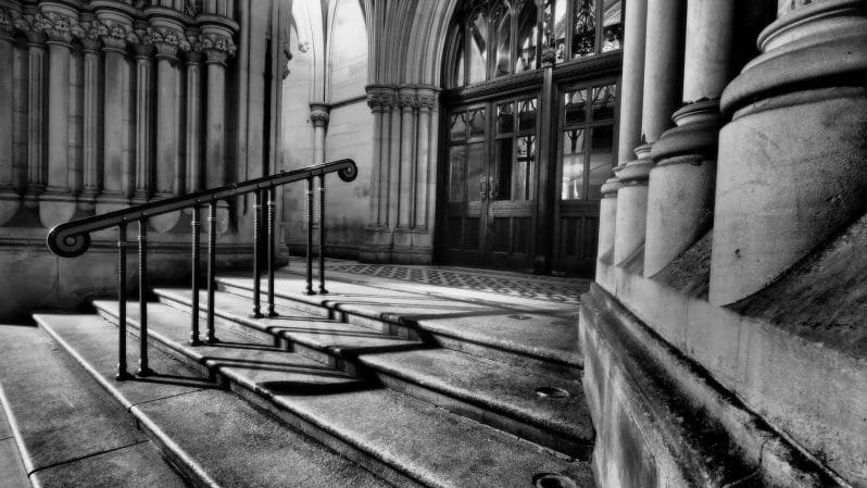 Black and White Photograph of steps leading to a doorway of an ornate building - WelshotRewards Day - Architectural Photography in Manchester