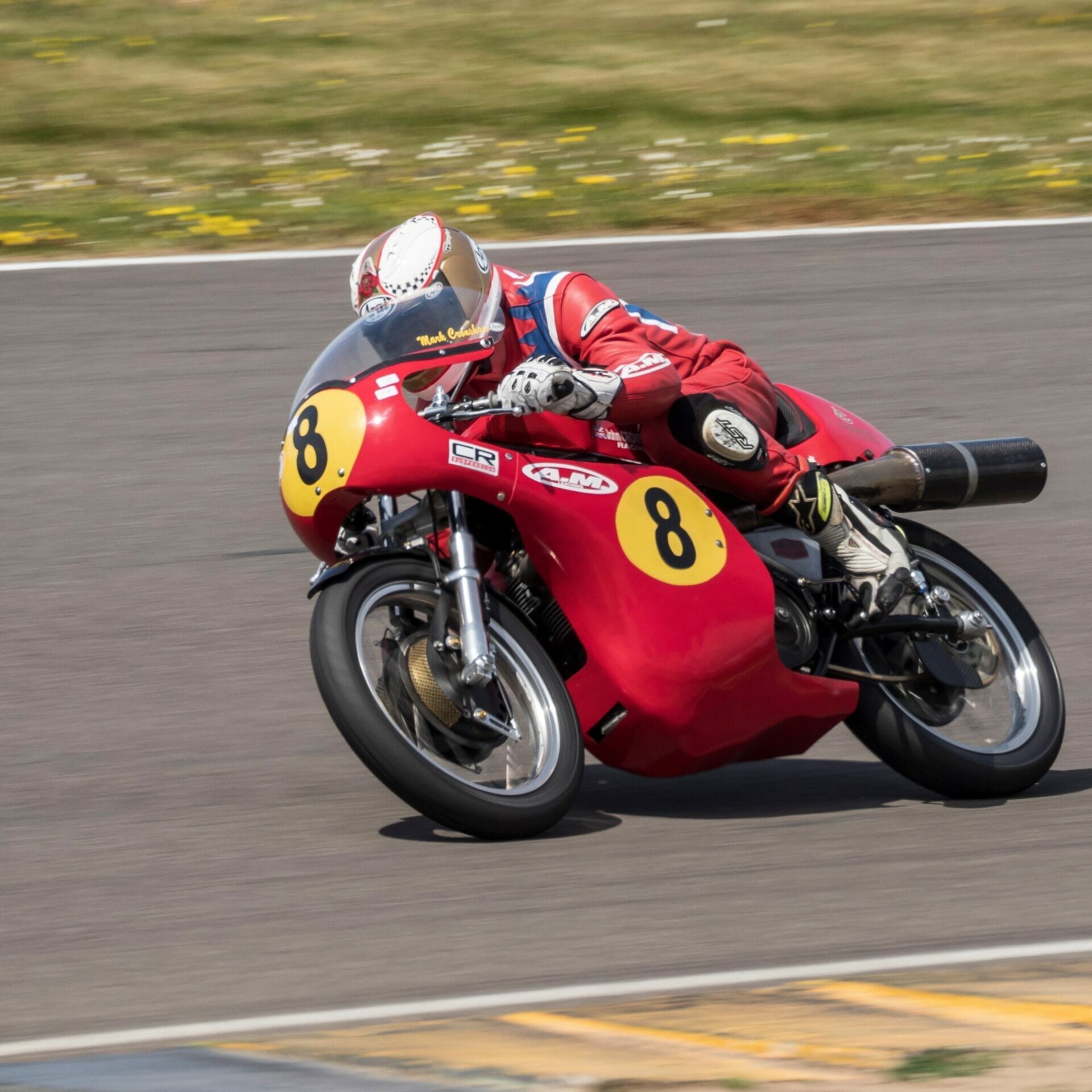 Photo of a rider on a motorbike racing around a track - Action Photography - Classic Bike Racing at Ty Croes Racetrack - WelshotRewards Day