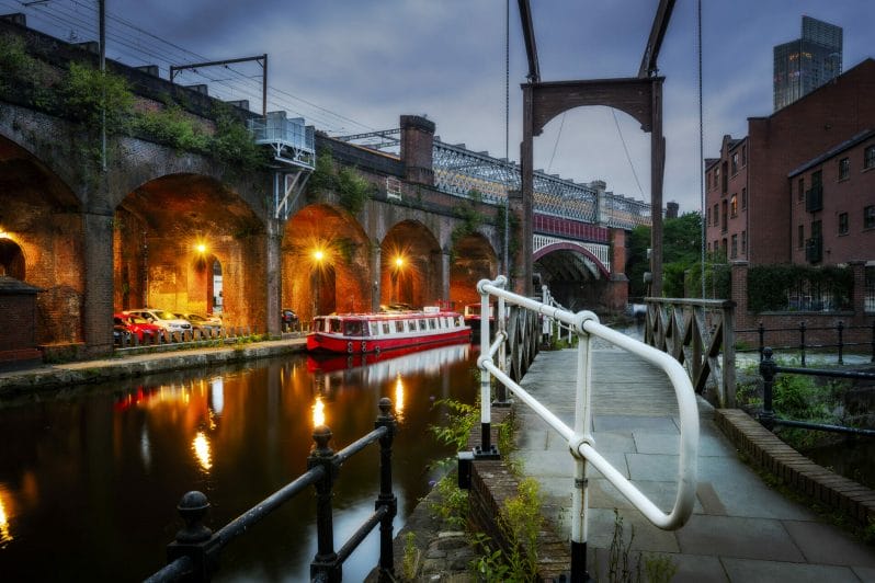Colour Photograph showing the Manchester overhead railway along the Castlefield Canal Basin Creative Cityscape Photography