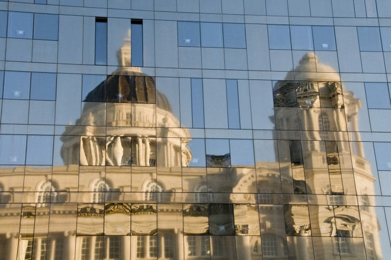 Photograph of historic building in Liverpool reflected on another glass building Creative Photography – City & Riverscape in Liverpool – Roving Academy Evening