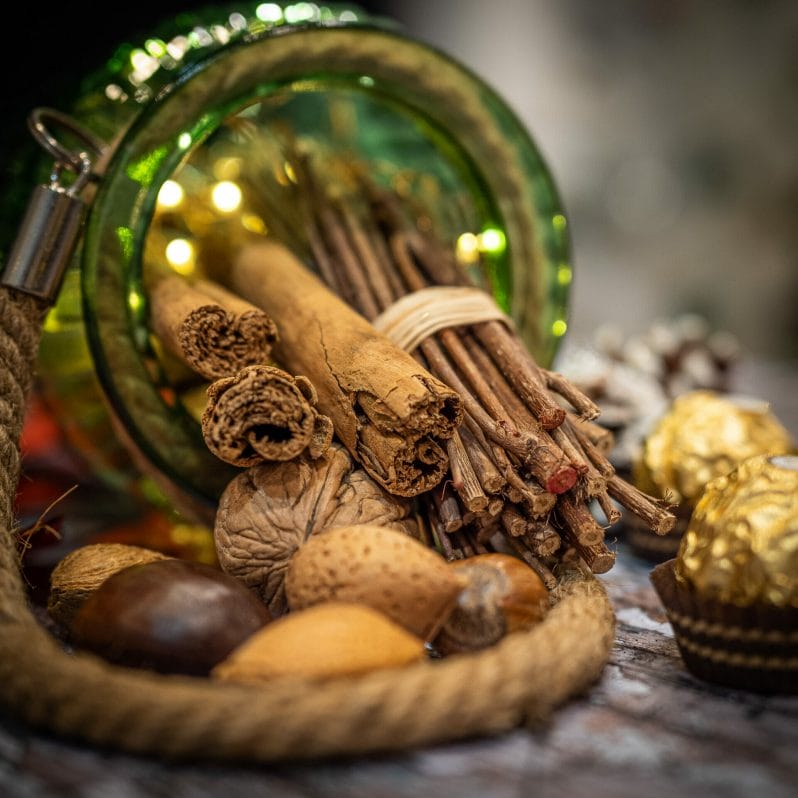 Christmas Food & Product Photography - Jar with Nuts and Cinnamon Sticks 