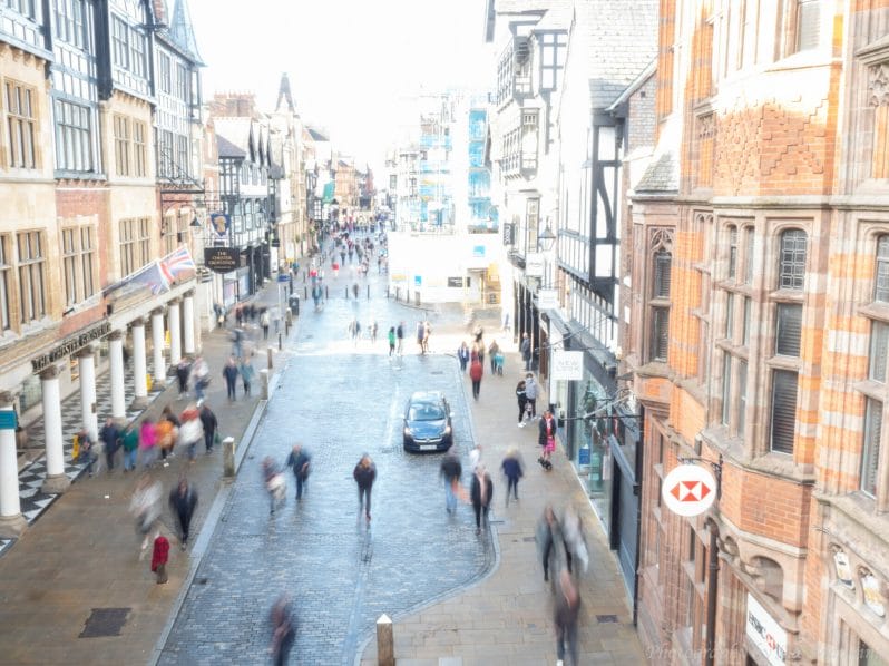Creative Photography - Chester Photographic Academy Evening - Long exposure image of people walking in Chester - taken from the City Wall near the clock
