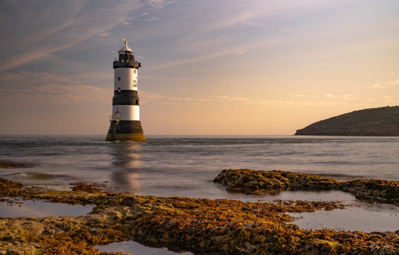 Shortest Night 2023 - A Photographic Adventure in North Wales - Photo of the sun rising over Puffin Island at Penmon Point Lighthouse in North Wales